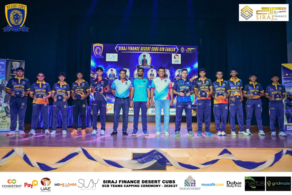 Desert Cubs players and coaches together on stage at the ECB capping ceremony — photograph 7510